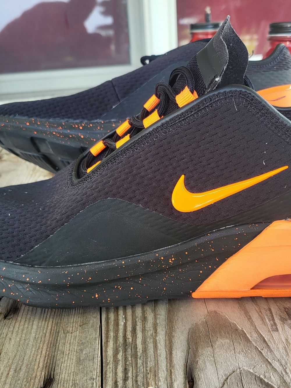 Nike Men’s Black and Orange Athletic Sneakers with Speckled Midsole